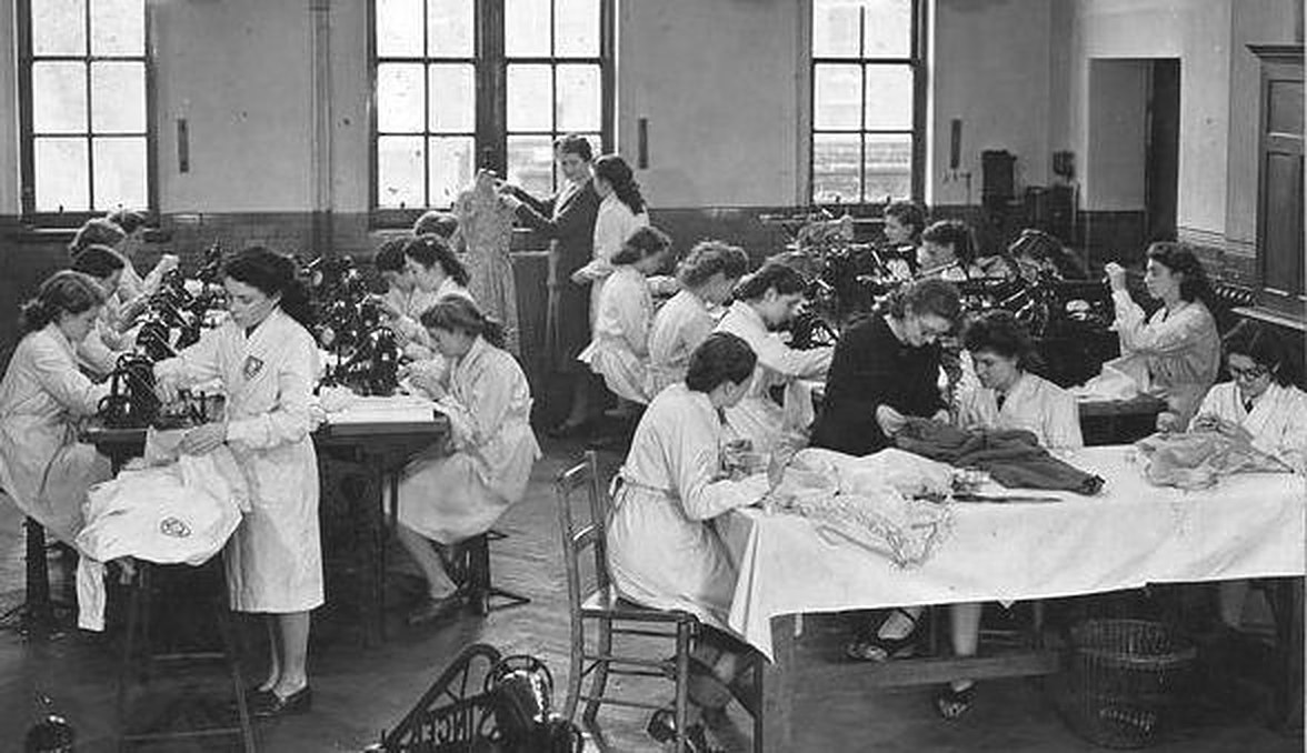 Archive photograph of students working in a pattern cutting studio at Curtain Road