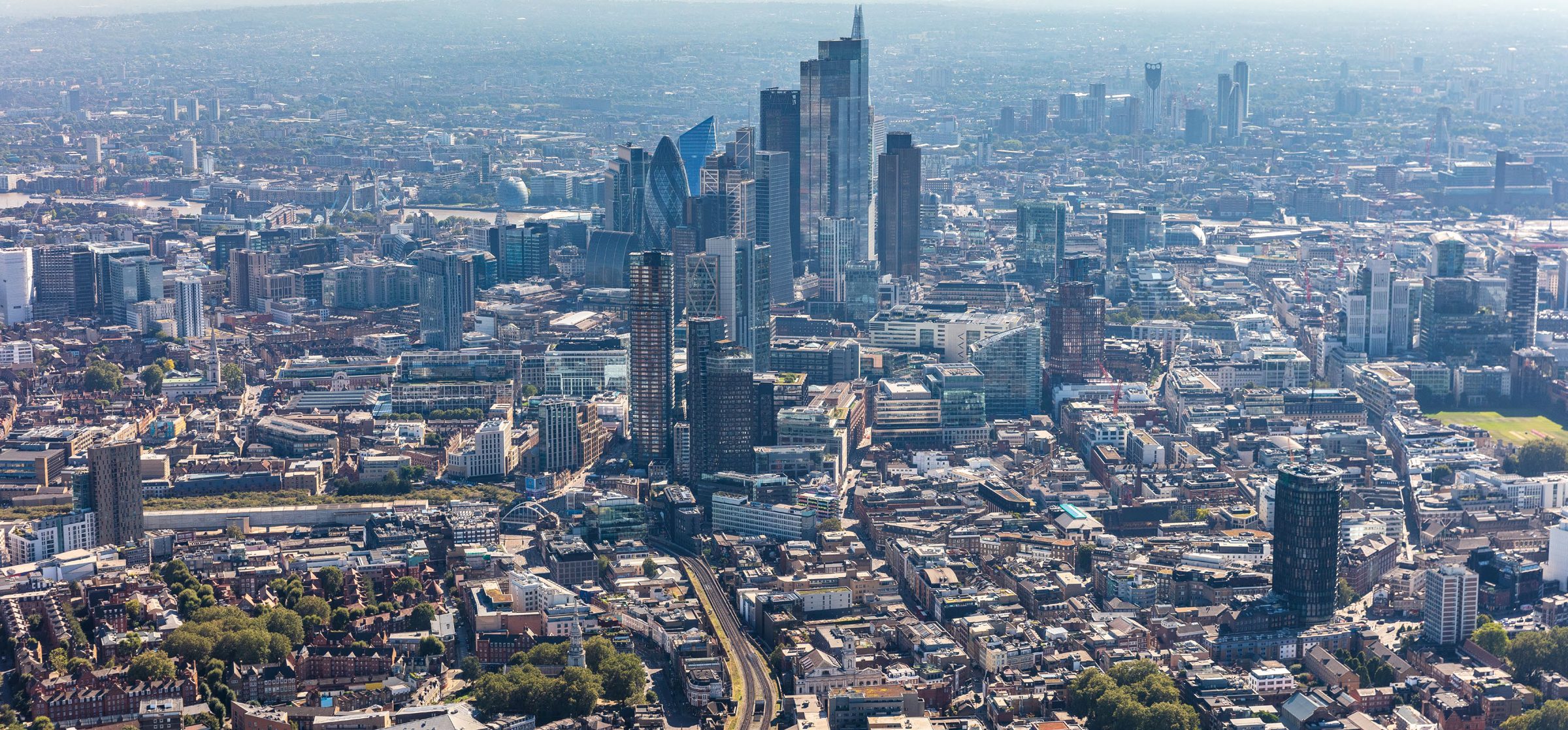 Aerial view looking south over Shoreditch towards the towers of the City of London