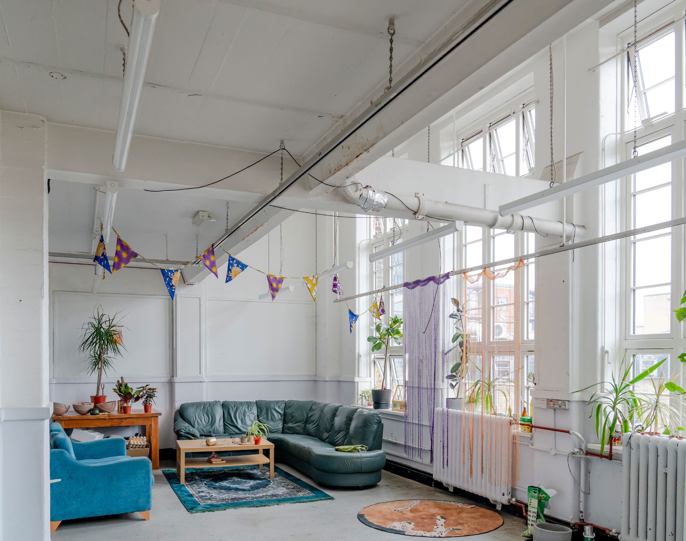 Bright corner room with a run of tall windows